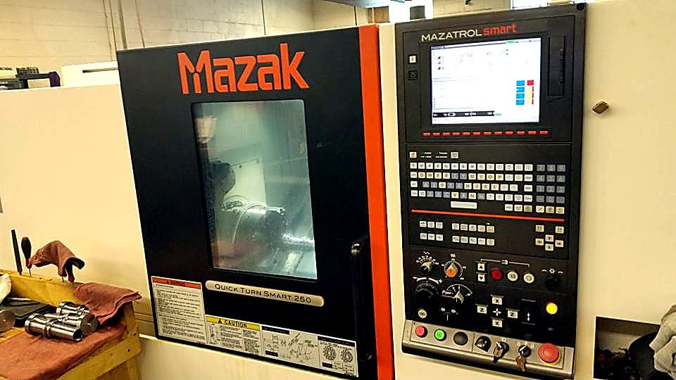 Mazak Quick Turn Smart 250 CNC machine and control panel.