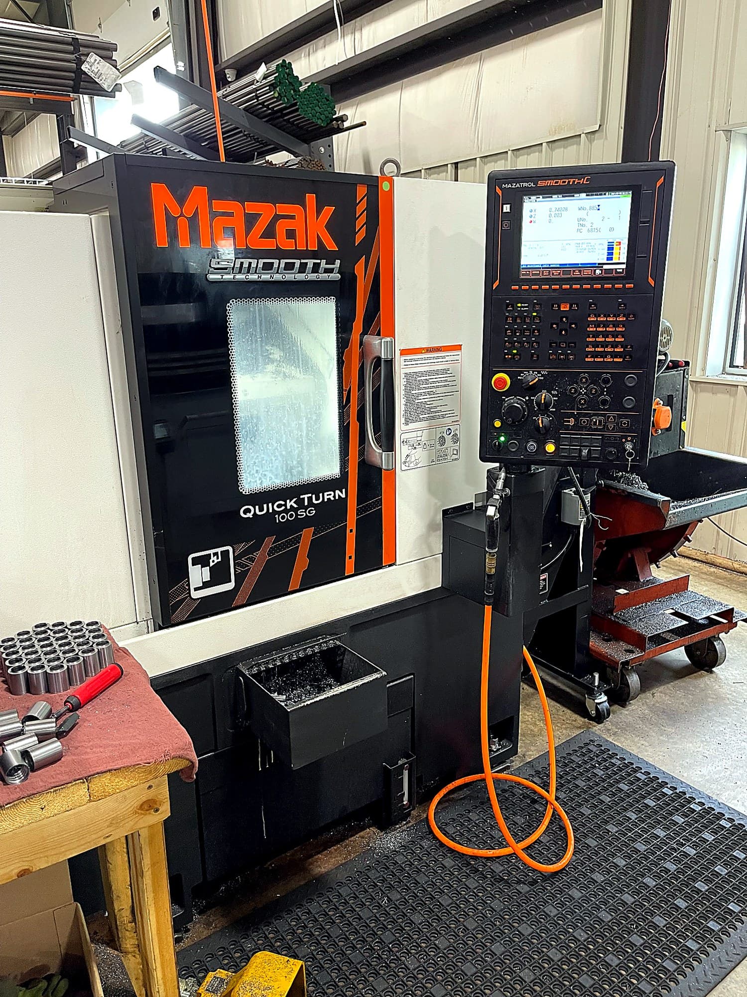 Mazak Quick Turn 100SG machine in operation area.
