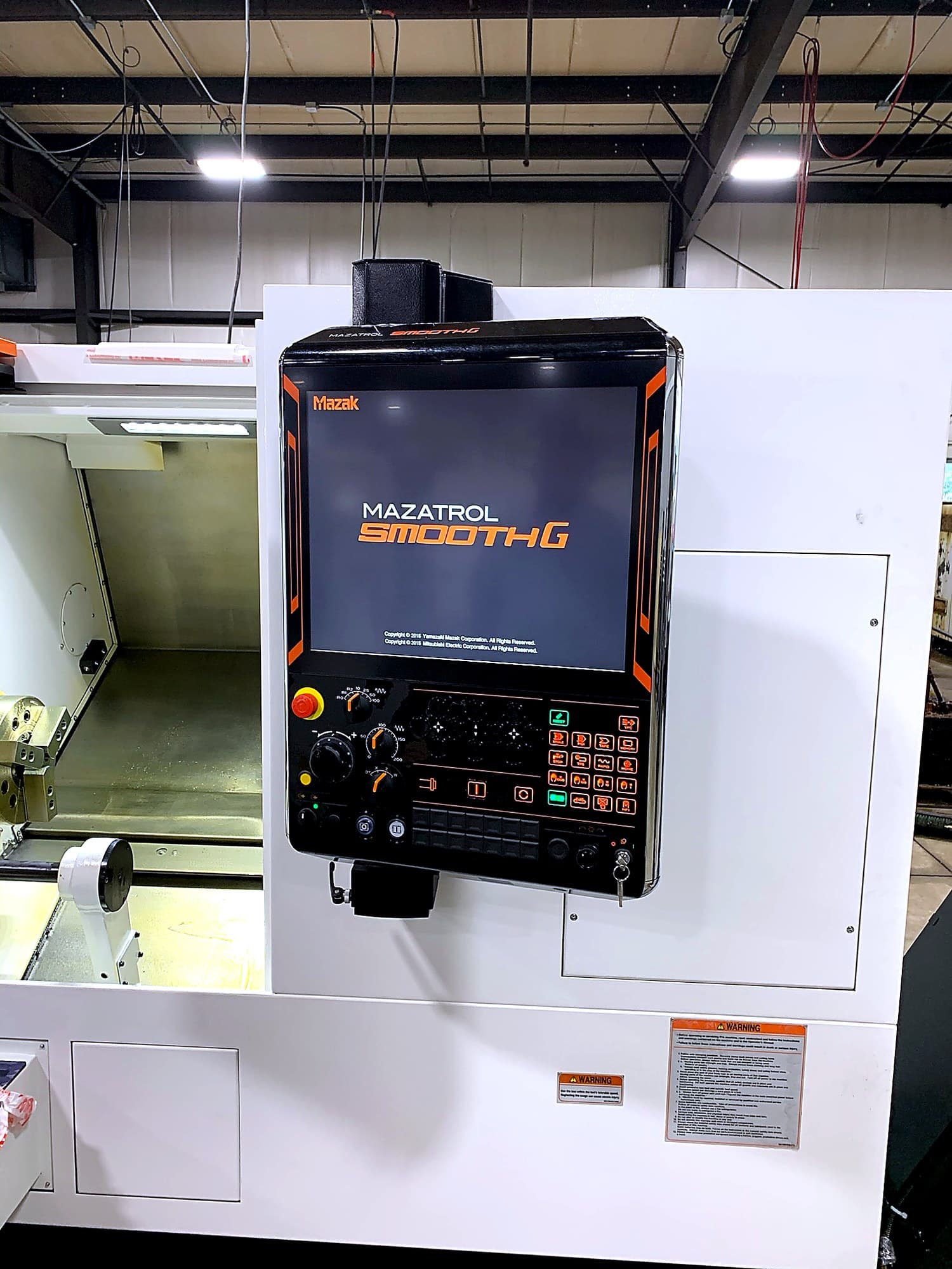 Close-up of Mazatrol SmoothG control panel on a Mazak machine.